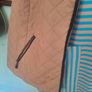 Quilted Isle gilet with knitted arm trim Image 8