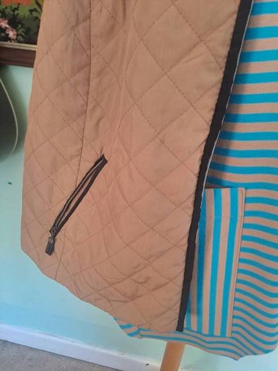 Quilted Isle gilet with knitted arm trim