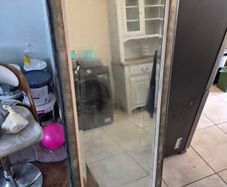 Large mirror in frame