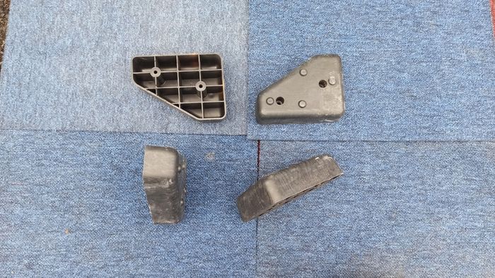 4 black hard plastic  sofa legs
