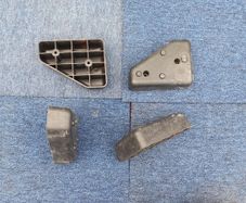 4 black hard plastic  sofa legs
