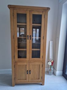 Solid oak display cabinet with glass doors