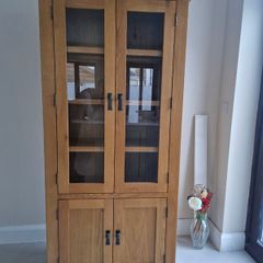 Solid oak display cabinet with glass doors