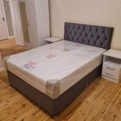 Double bed with mattress and beautiful headboard