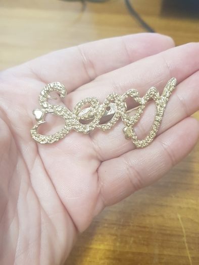 "Sexy" brooch
