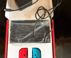 Nintendo Switch Neon Red/Blue with Improved Battery Life- Barely used