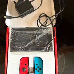 Nintendo Switch Neon Red/Blue with Improved Battery Life- Barely used