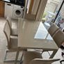 Extending dining table and chairs for sale Image 2