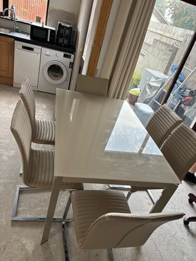 Extending dining table and chairs for sale
