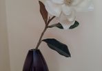 Purple bullet glass vase with cream single flower
