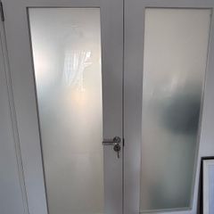 White wood and glass interior door