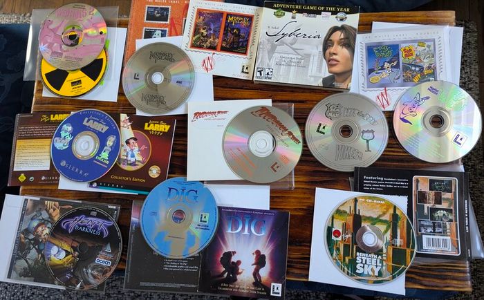 old pc Games collection monkey island, Indiana jones , day of the tentacle etc.