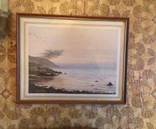 Framed vintage picture of coastal scene