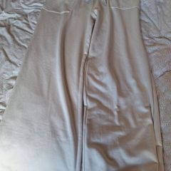 Trousers label still on