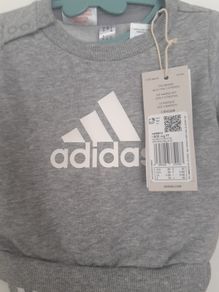 New baby boy bundle with tags .Consists of Addidas tracksuit . Name it top .Hat and gloves .pack of 7 pair socks .2 pair of rattle socks and free sunhat new  and green cable jumper all new  17 euro the lot