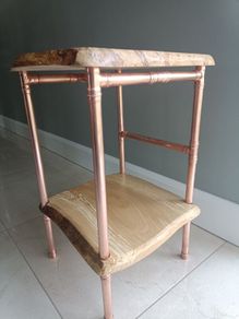 Copper pipe side table.D 41cm. H 61cm W36cm...