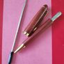 Handcrafted  Rosewood ballpoint pen with gold trim Image 3