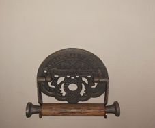 Cast iron toilet holder