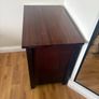Dark wood chest of drawers and matching locker Image 4