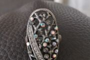 Nice ring or can be used for hold a scarf together.