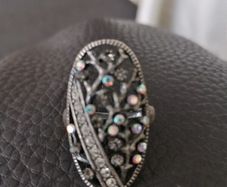 Nice ring or can be used for hold a scarf together.