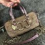 vintage Guess Y2K small monogram bag in a brown and pink glitter colorway. Image 2