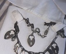 CHRISTIAN DIOR Vintage Silver Tone Figural Charm Necklace