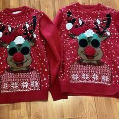 Two matching light-up Christmas reindeer jumpers