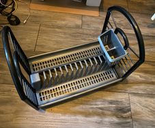Black and grey plastic kitchen dish drying rack