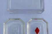 vintage set of molded glass card suit dishes and a matching container, commonly used as bridge ashtrays or nut/trinket dishes.