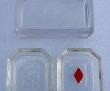 vintage set of molded glass card suit dishes and a matching container, commonly used as bridge ashtrays or nut/trinket dishes.