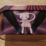 Pokemon Tin and 60 Pokemon cards Image 5