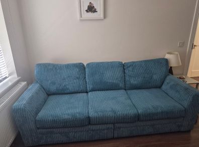 4 seater couch. Split base makes rooms with tight access easy