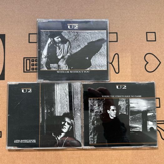 U2 cd singles x 8 ( 80's 84/89 )