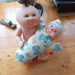 Cabbage patch doll and glo worm doll