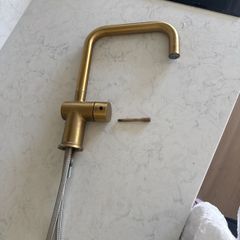 Brass kitchen tap