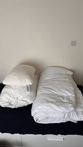 2 king size duvets and a pillow