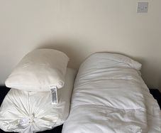 2 king size duvets and a pillow