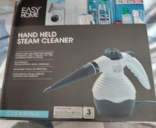 Hand held steam cleaner