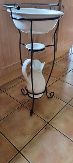 Vintage washbasin on a metal stand