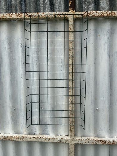 6 wire plant holders and 2 lawn plant protectors