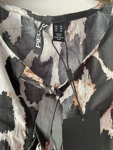 Pieces ladies top size 14 to 16 New