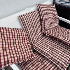Two chair cushions and two sun lounger cushions