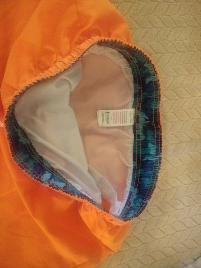 Boys orange swim shorts