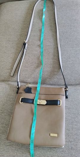 Liberty by Gionni genuine leather handbag in very good condition with lots of pockets zipped closures and adjustable shoulder strap one small mark see fourth last photo and see last three photos for exact measurements FREE TRACKED POSTAGE INCLUDED