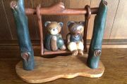 Vintage wooden bears on swing ornament