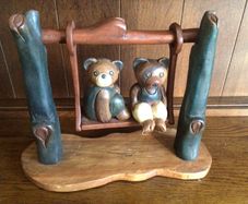 Vintage wooden bears on swing ornament