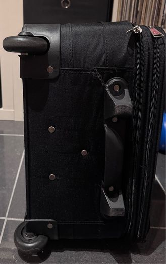 Black suitcase with brown trim