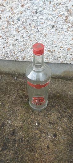 Smirnoff volka 3 litre bottle ,,with cork ,nice patina condition, handy for 1 or 2 euro coins ,etc ,,or display advertising item for home bar etc ,sold as is,