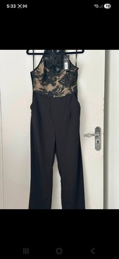 AX pairs jumpsuit new with tags